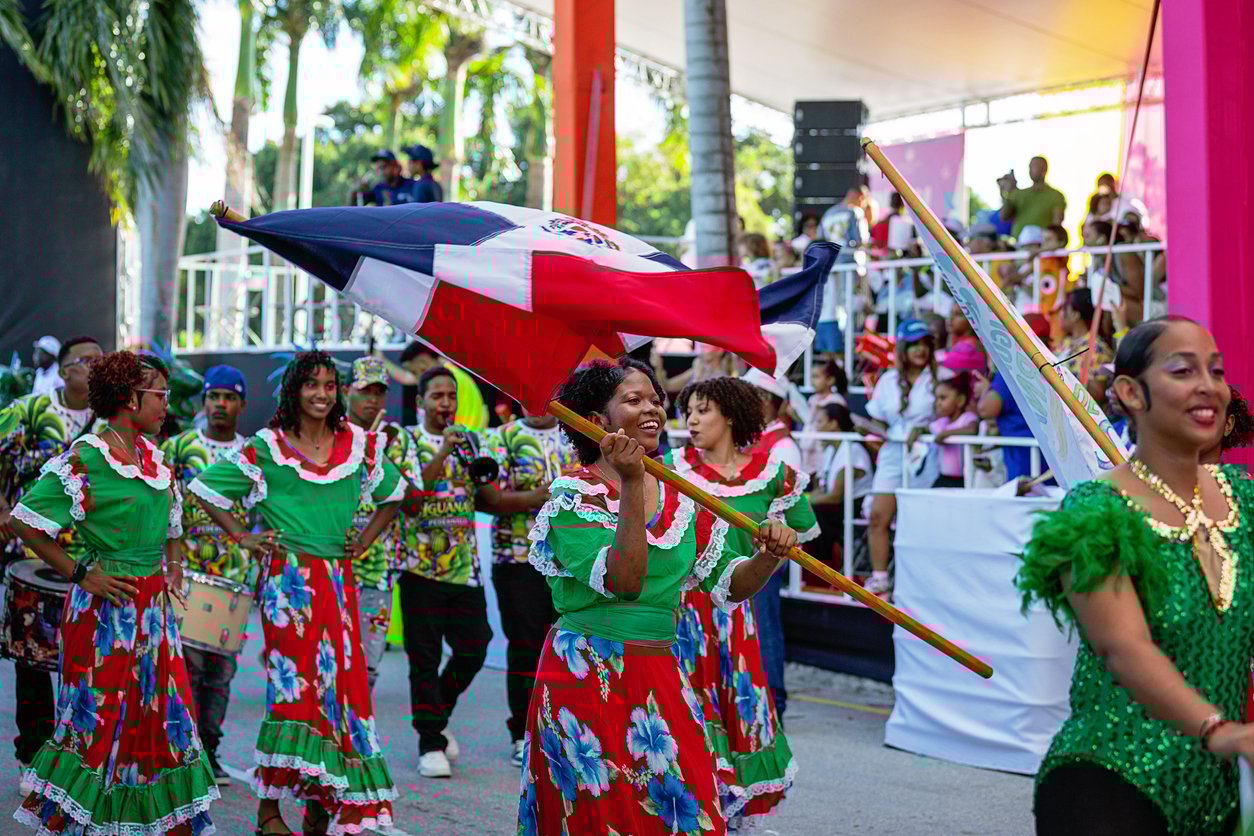 Women in colorful costumes at carnival in the Dominican Republic