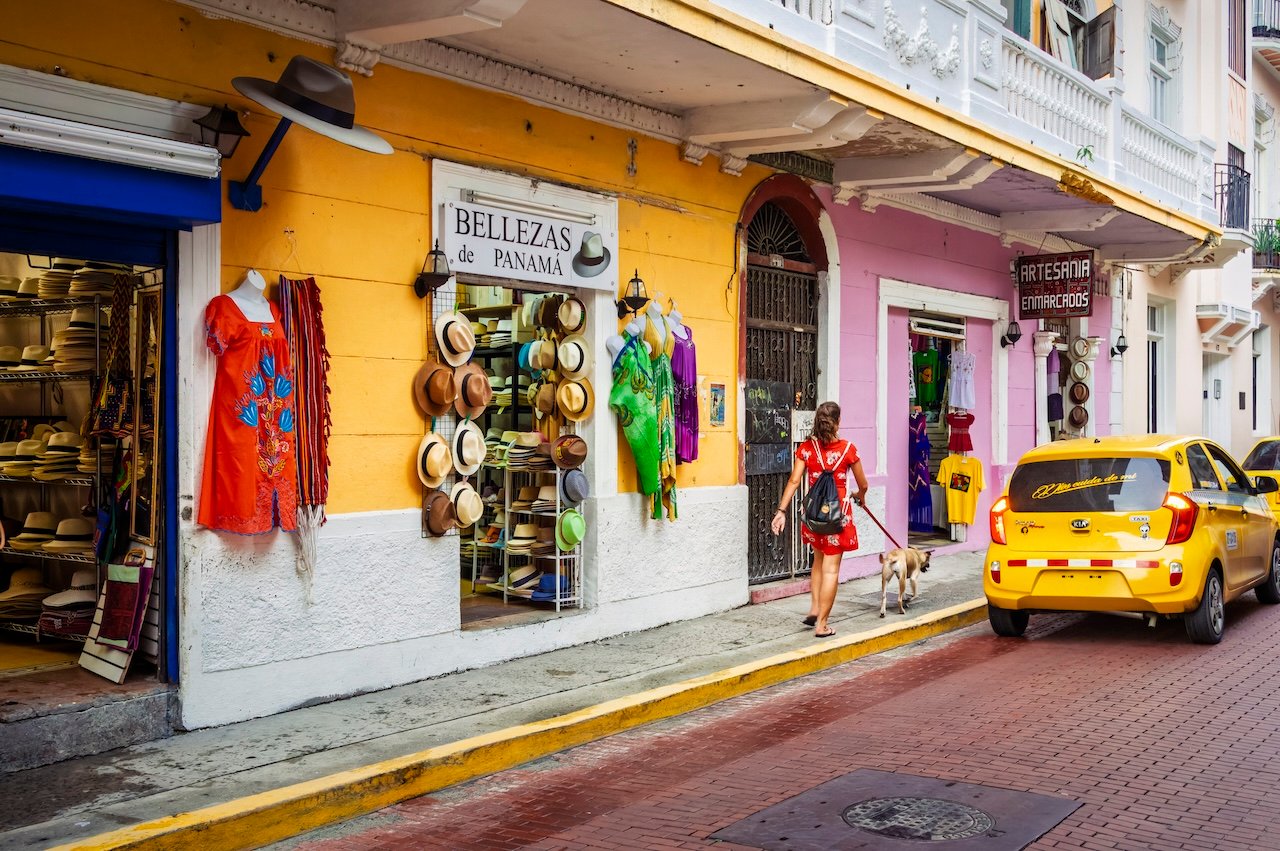 Colorful storefronts along a Panama City street, where knowing Spanish makes everyday interactions more meaningful.
