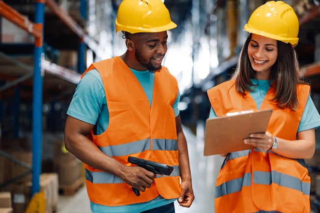 Waarehouse worker focusing on tasks and teamwork.